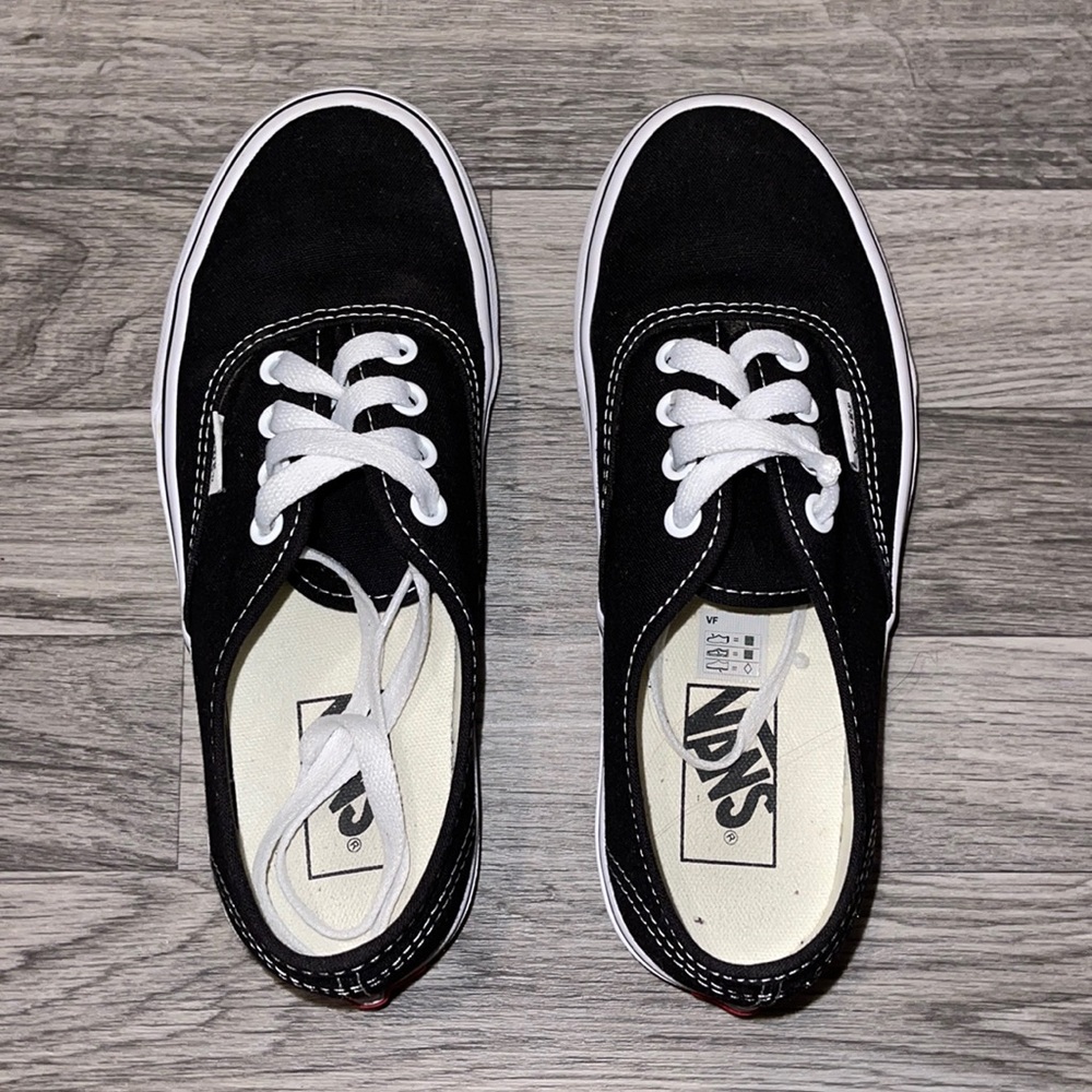 Black and white authentic vans